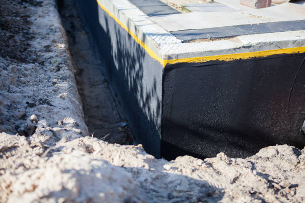 Professional Basement Waterproofing technician working in Avondale, PA
